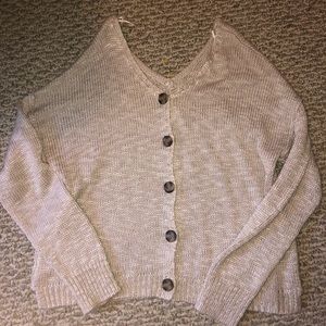 cream colored v neck sweater